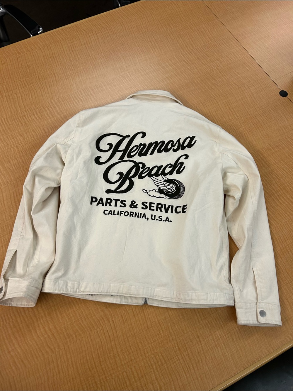 Hollister Cream Jacket with Black Hermosa Beach Back Graphic
